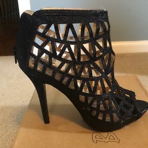 Black metalli laser cut ankle boots